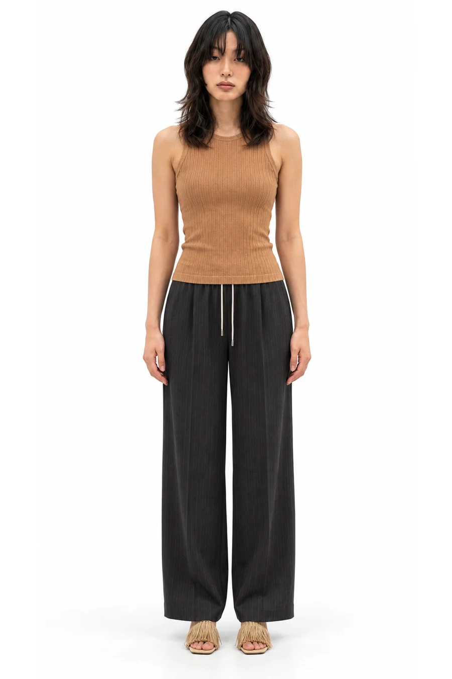 AI outfit preview: Ribbed Tank Top · Light brown, Wide-Leg Twill Pants · Dark gray/pinstriped, Fringe-Trimmed Heeled Sandals · Dusty yellow
