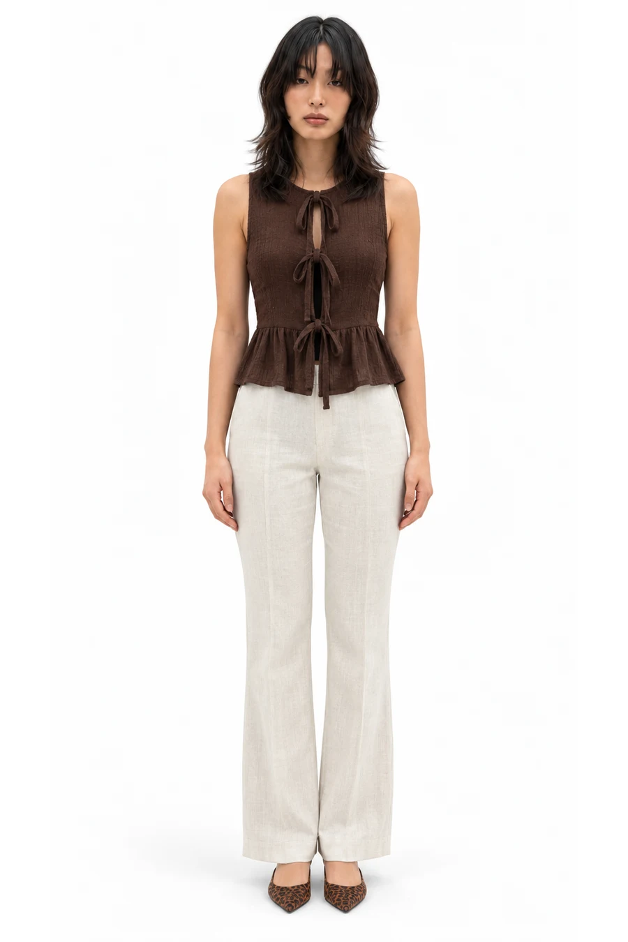 AI outfit preview: Tie-Front Peplum Top · Brown, Bootcut Linen-Blend Pants · Light beige, Pointed Slingbacks · Brown/leopard print