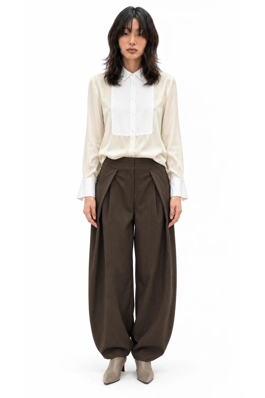 AI outfit preview: 100% SILK BIB SHIRT ZW COLLECTION - Mid-ecru, PLEATED BALLOON PANTS - Brown Stripes, LEATHER KITTEN HEEL BOOTIES - Taupe Gray
